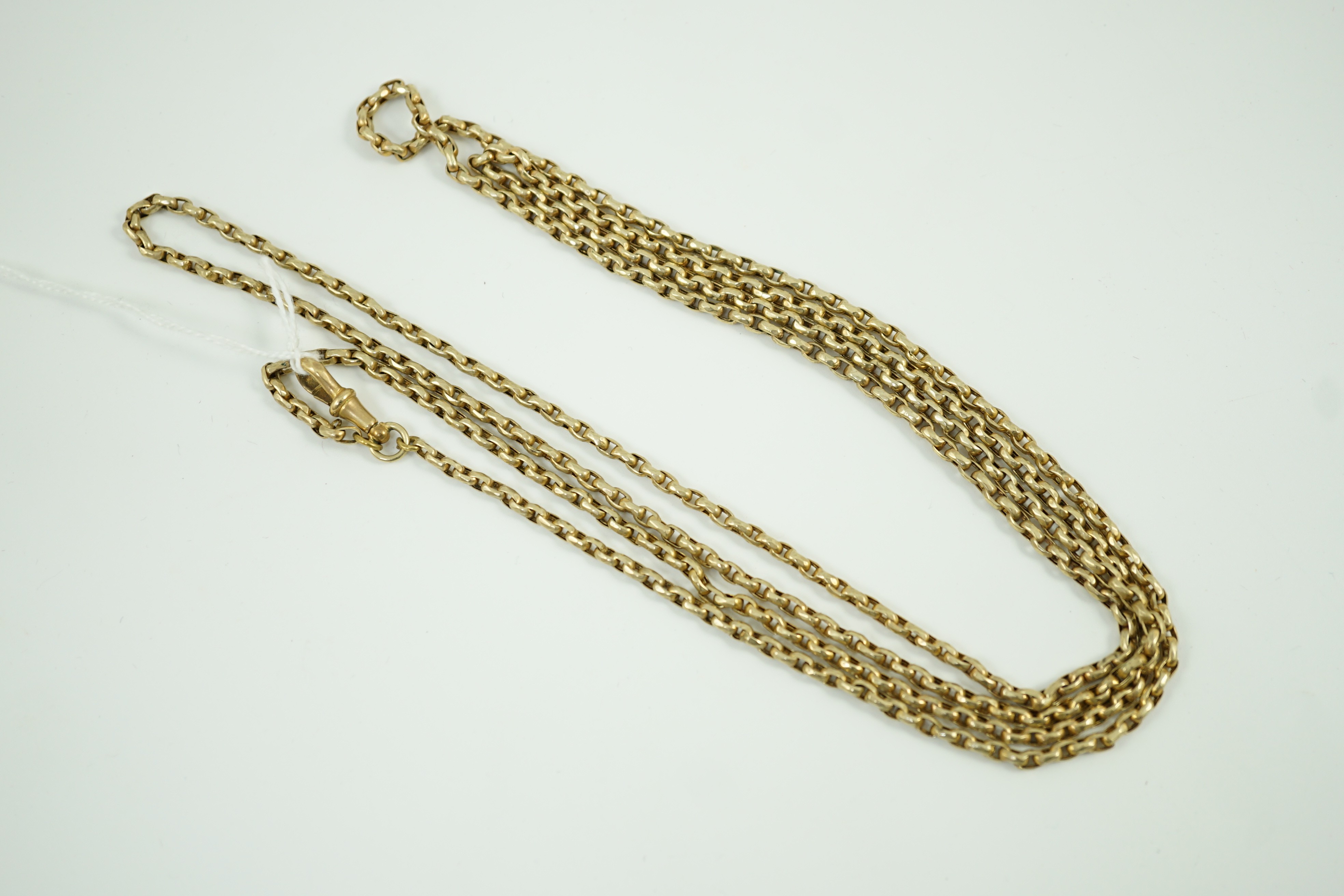 A late Victorian yellow metal guard chain, 146cm, 29.2 grams.